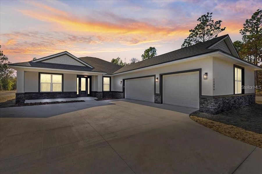 Front exterior of a new home in , Dunnellon, FL, highlighting curb appeal (Image 27).