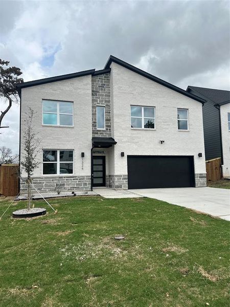 Front exterior of a new home in , Dallas, TX, highlighting curb appeal (Image 15).
