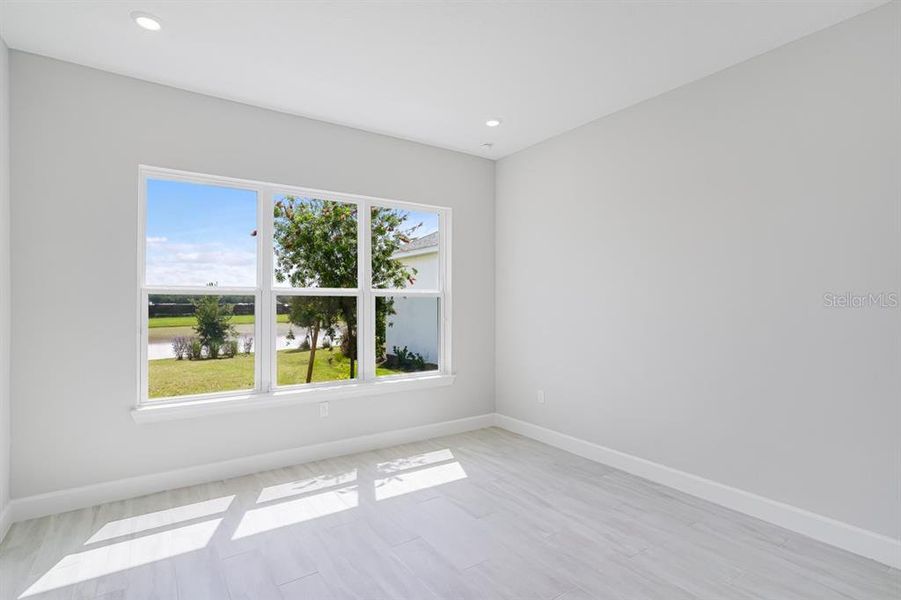 Spacious, unfurnished interior of a new home in Esplanade at Westview, Kissimmee (Image 28).