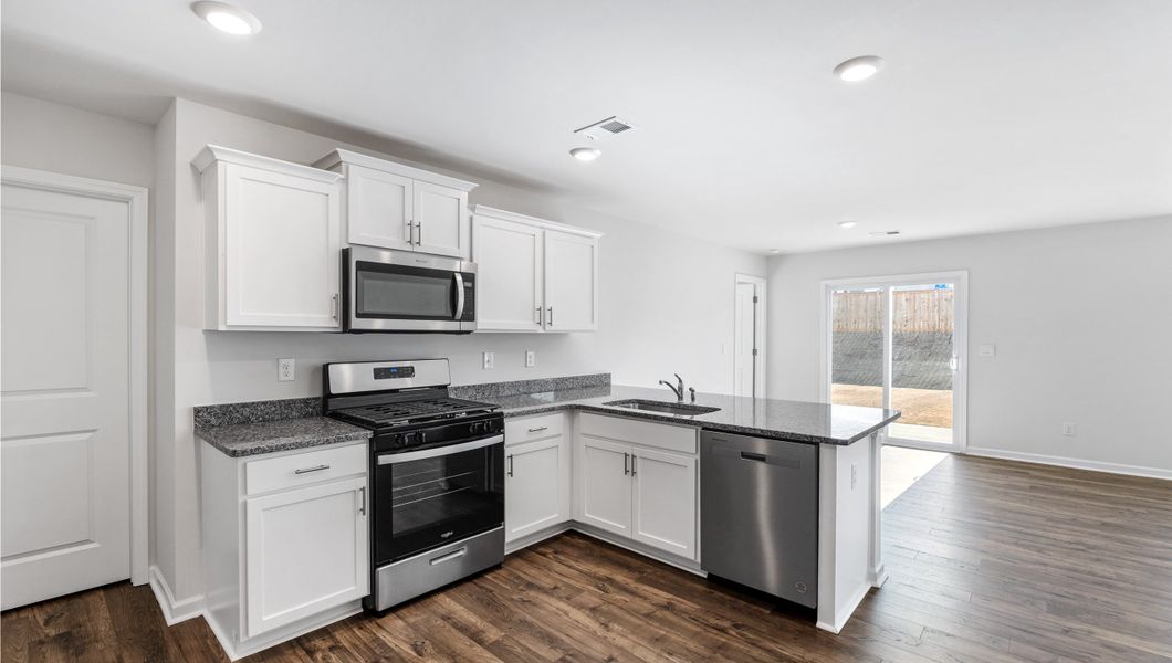 Furnished interior view inside a new home in Treemont Commons, Wellford (Image 4).