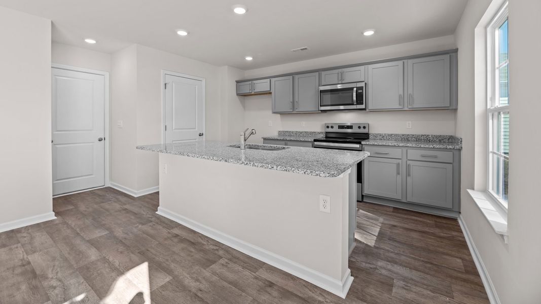 Furnished interior view inside a new home in Madeline Farm, New Bern (Image 6).