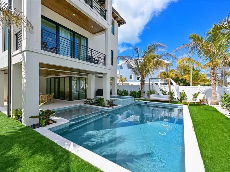 Exterior details and patio area of a home in , Bradenton Beach (Image 3).