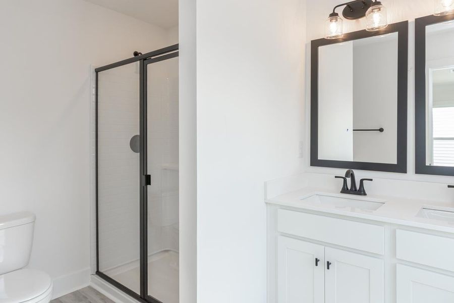 Representative furnished interior of a home built from the 1692 Townhome by Adams Homes in Parkstone Place Townhomes, Roebuck (Image 7).