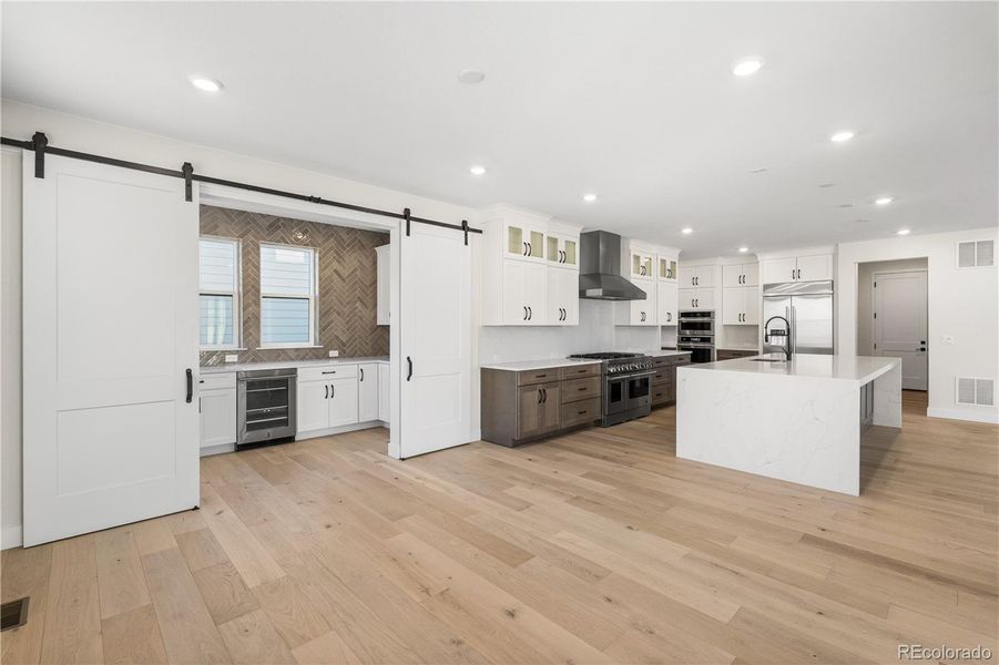 Furnished interior view inside a new home in Autograph at Lyric, Lone Tree (Image 17).