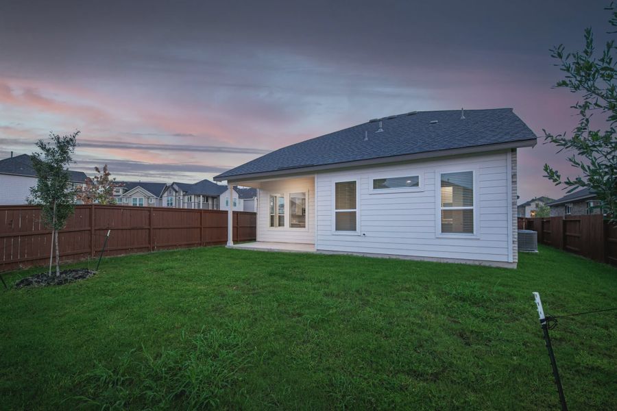 Exterior details and patio area of a home in Alsatian Oaks, Castroville (Image 3).