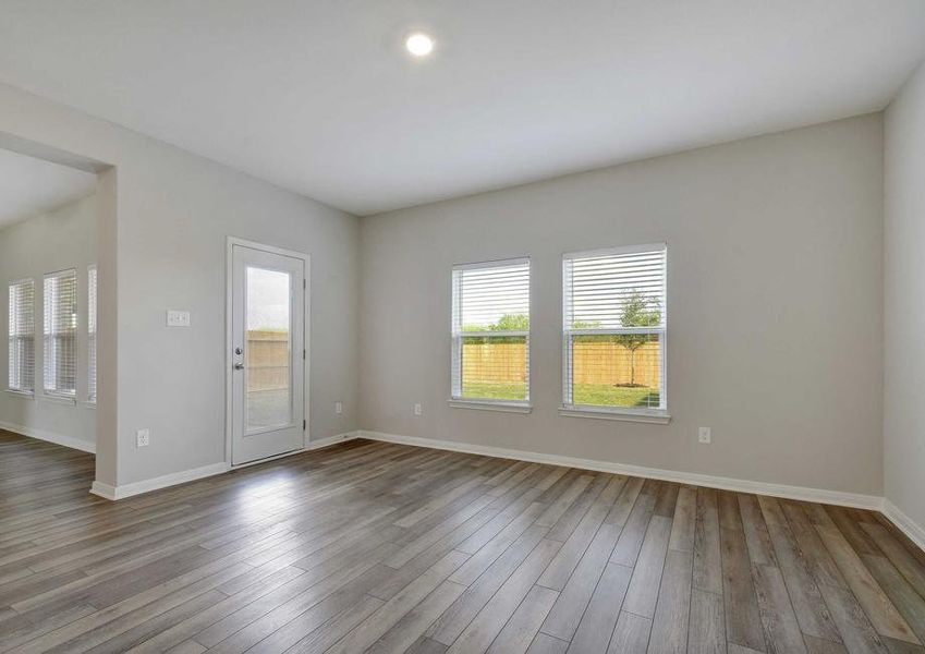 The dining room connects to the kitchen for ease of flow during mealtime.