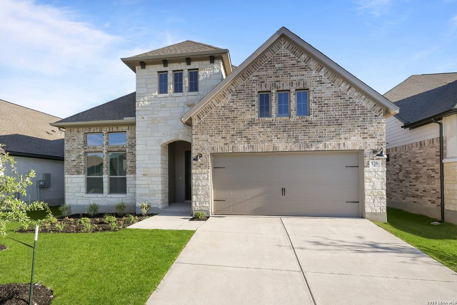 Front exterior of a new home in Nopal Valley, San Antonio, TX, highlighting curb appeal (Image 25).