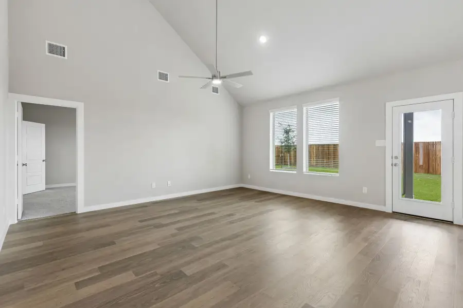 Living Room in the Winters home plan by Trophy Signature Homes – REPRESENTATIVE PHOTO