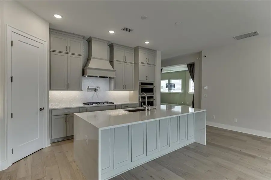 Furnished interior view inside a new home in The Retreat at Sterling on the Lake 48', Flowery Branch (Image 9).