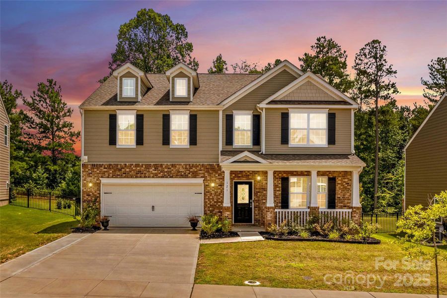 Front exterior of a new home in Calvin Creek, Troutman, NC, highlighting curb appeal (Image 23).