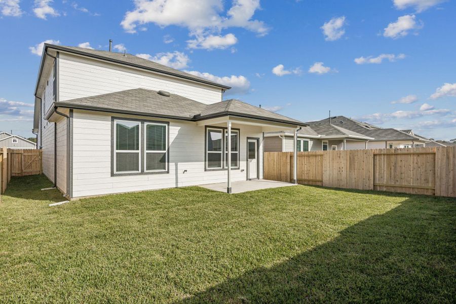 Exterior details and patio area of a home in Decker Farms, Magnolia (Image 3).