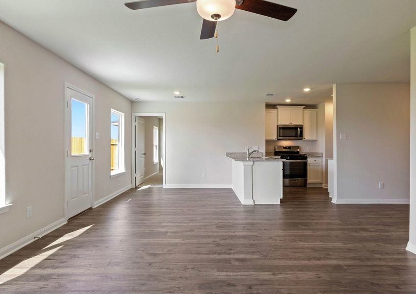 Dining room and adjoining kitchen Dining room and adjoining kitchen
