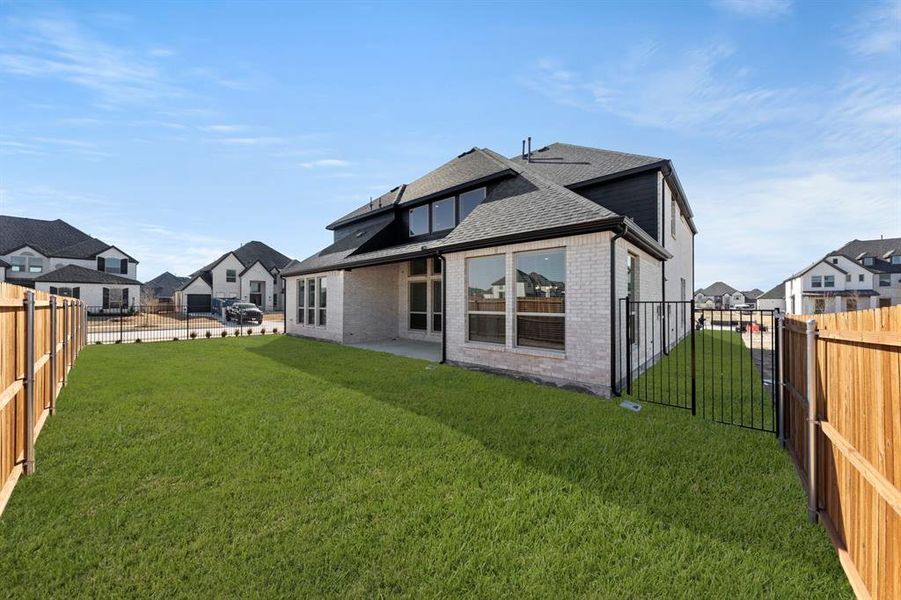 Exterior details and patio area of a home in Collinsbrook Farm, Frisco (Image 22).