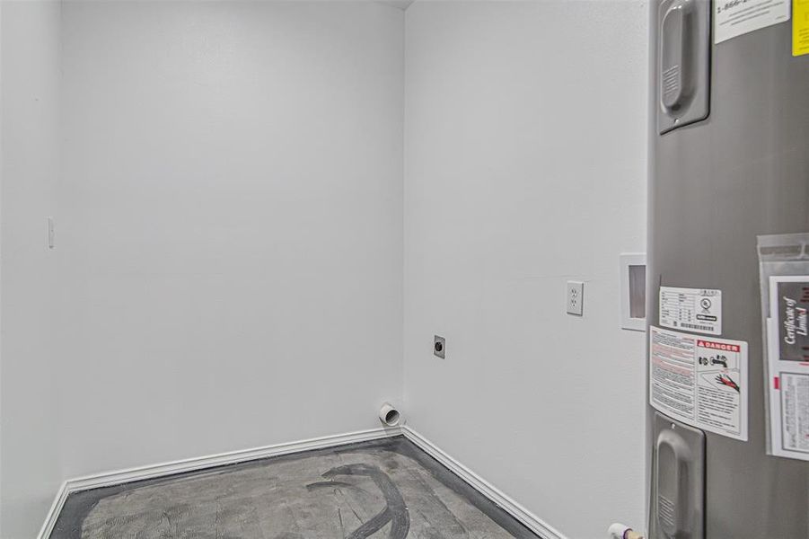 Laundry area with electric dryer hookup, hookup for a washing machine, and electric water heater