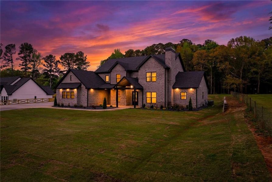 Front exterior of a new home in , Monroe, GA, highlighting curb appeal (Image 32). Front exterior of a new home in , Monroe, GA, highlighting curb appeal (Image 32).