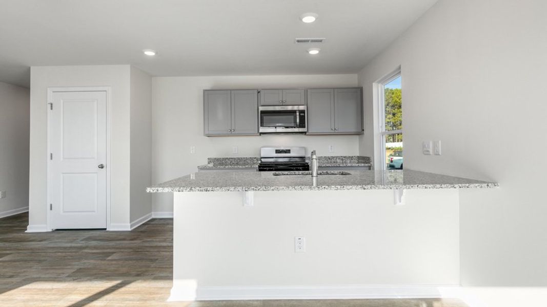 Furnished interior view inside a new home in The Townes at Honeycutt Oaks, Angier (Image 5).