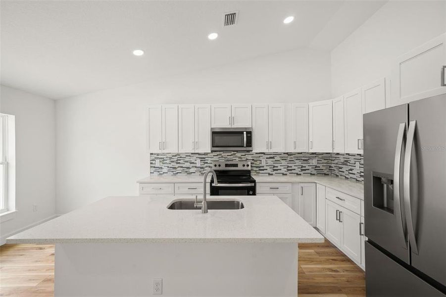 Furnished interior view inside a new home in , Weeki Wachee (Image 17).