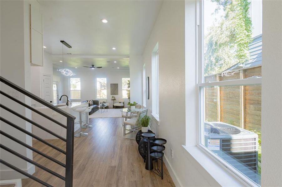 Entrance foyer with light wood-type flooring, recessed lighting, and a ceiling fan Entrance foyer with light wood-type flooring, recessed lighting, and a ceiling fan