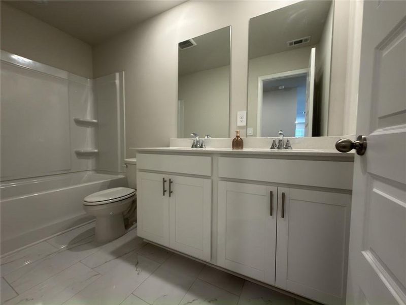 Furnished interior view inside a new home in Martin Springs - Estate Series, Lawrenceville (Image 6).
