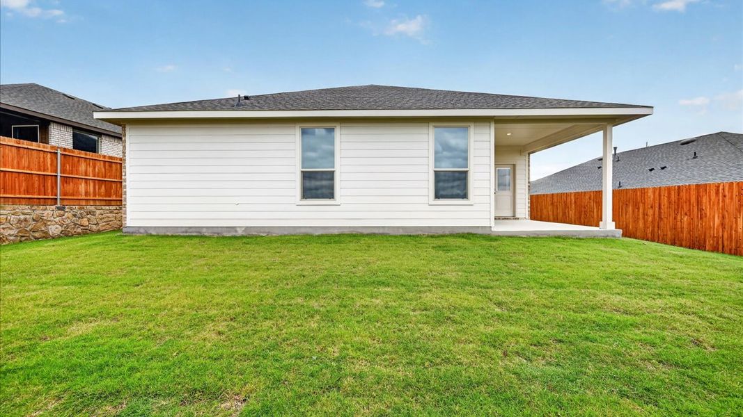 Exterior details and patio area of a home in Bluestem, Rhome (Image 3).