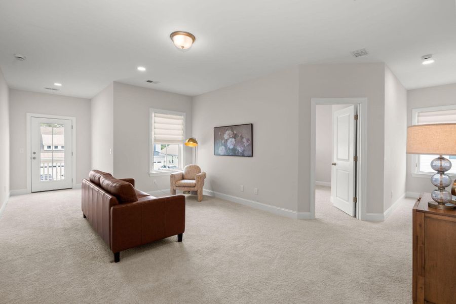 Furnished interior view inside a new home in Tidewater at Lakes of Cane Bay, Summerville (Image 44).
