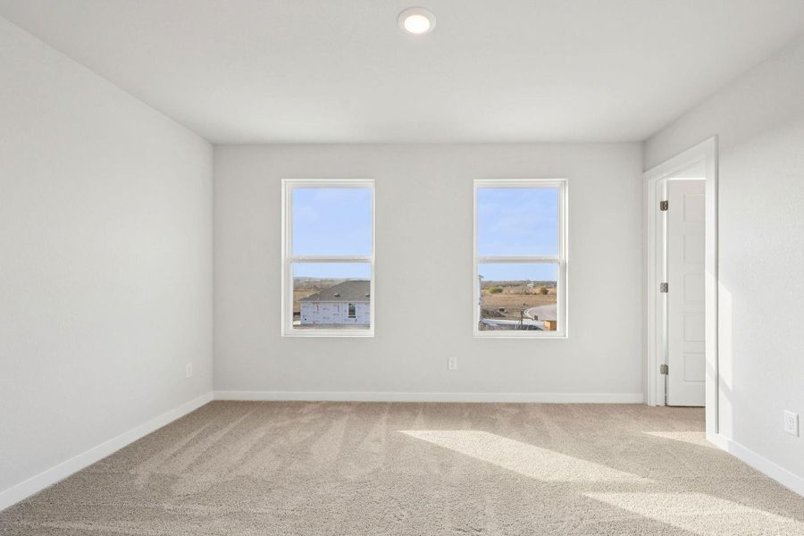 Spacious, unfurnished interior of a new home in Stallion Run, Buda (Image 23).