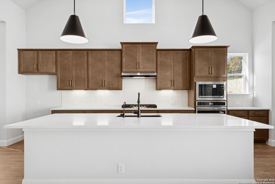 Furnished interior view inside a new home in Windsong - Legacy Series, Boerne (Image 9).