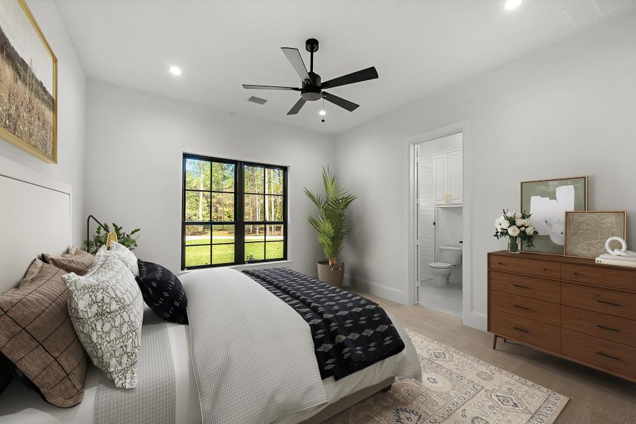 Inviting secondary bedroom with soft natural lighting and room for various furniture configurations. Photo may be virtually staged Inviting secondary bedroom with soft natural lighting and room for various furniture configurations. Photo may be virtually staged