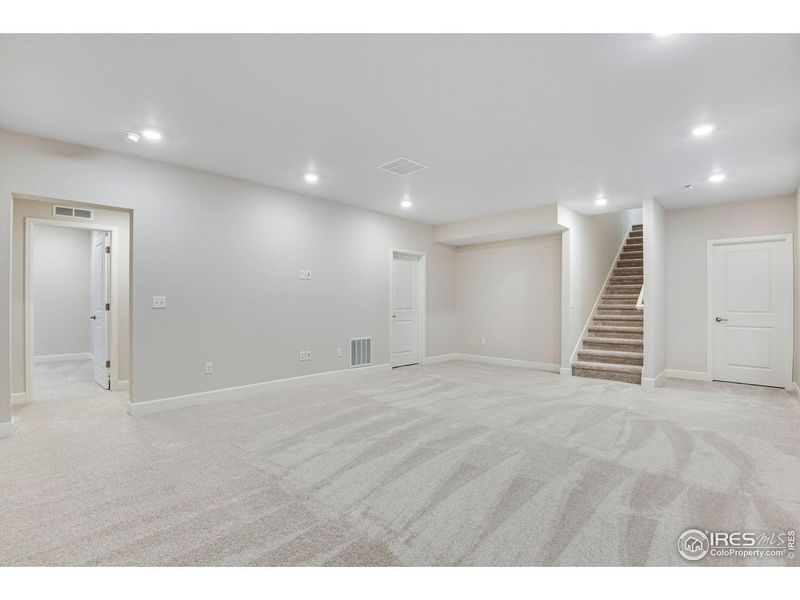 Spacious, unfurnished interior of a new home in Westside Crossing, Berthoud (Image 27).