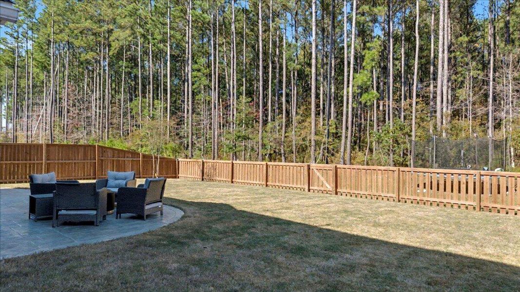 Exterior details and patio area of a home in Hewing Farms, Summerville (Image 26). Exterior details and patio area of a home in Hewing Farms, Summerville (Image 26).