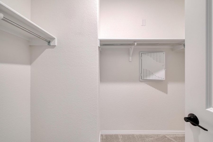 Furnished interior view inside a new home in Mustang Valley, Manor (Image 8).