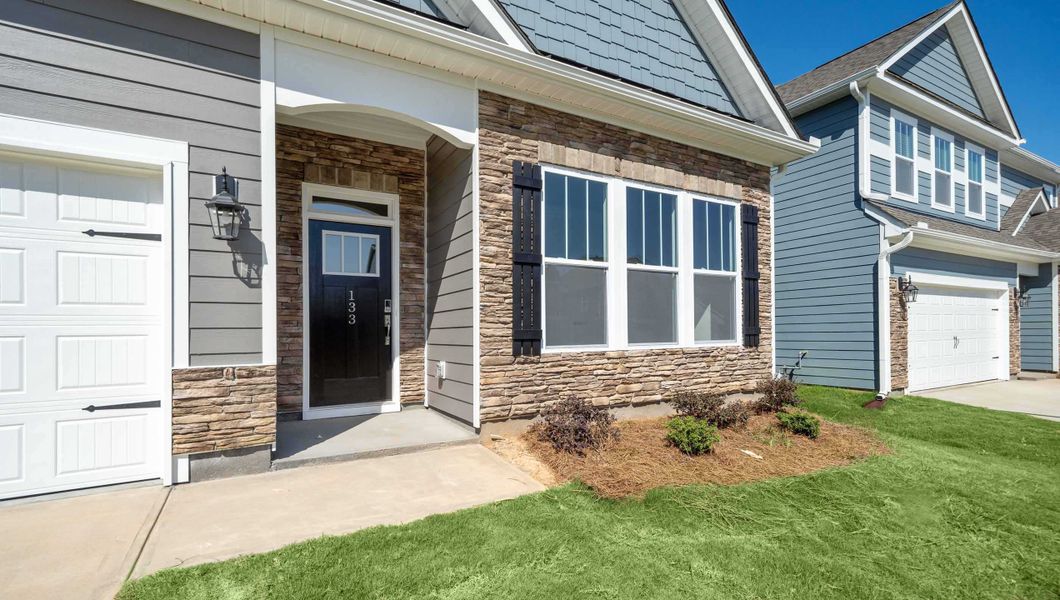 Exterior details and patio area of a home in Sunset Summits, Spartanburg (Image 2). Exterior details and patio area of a home in Sunset Summits, Spartanburg (Image 2).