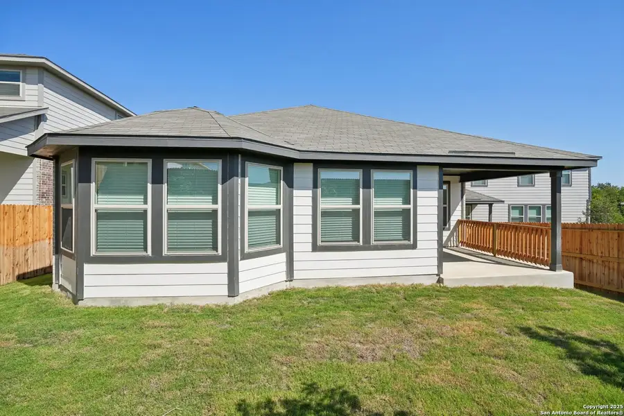 Front exterior of a new home in Comanche Ridge, San Antonio, TX, highlighting curb appeal (Image 1). Front exterior of a new home in Comanche Ridge, San Antonio, TX, highlighting curb appeal (Image 1).