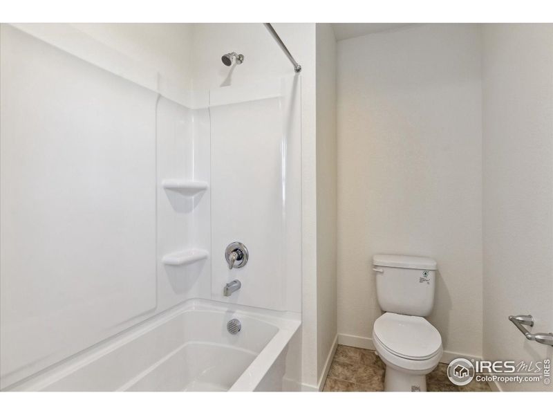 Furnished interior view inside a new home in Silver Peaks, Lochbuie (Image 6).