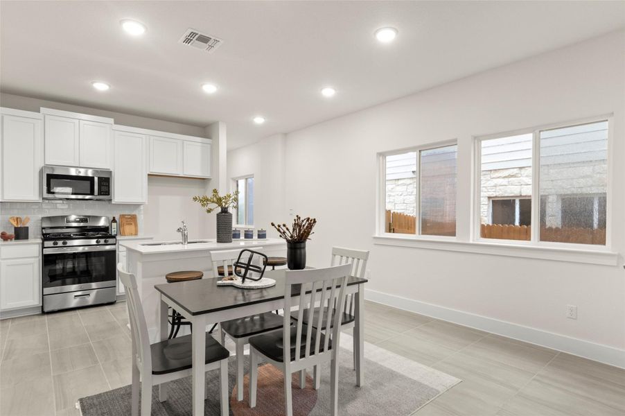 Furnished interior view inside a new home in Saddle Creek Twinhomes, Georgetown (Image 3).