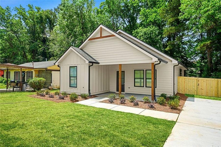 Front exterior of a new home in , Atlanta, GA, highlighting curb appeal (Image 22).