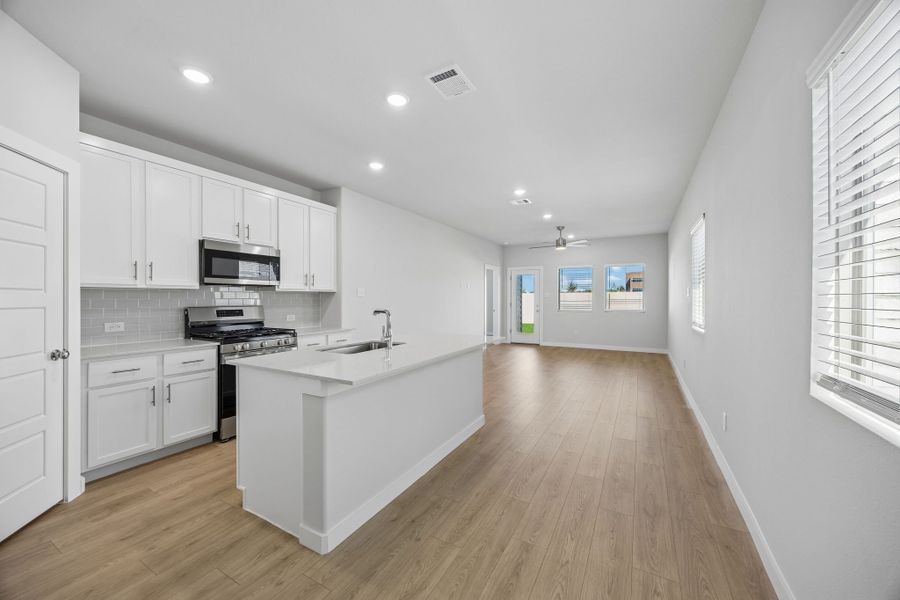 Open Concept in the Birch home plan by Trophy Signature Homes – REPRESENTATIVE PHOTO