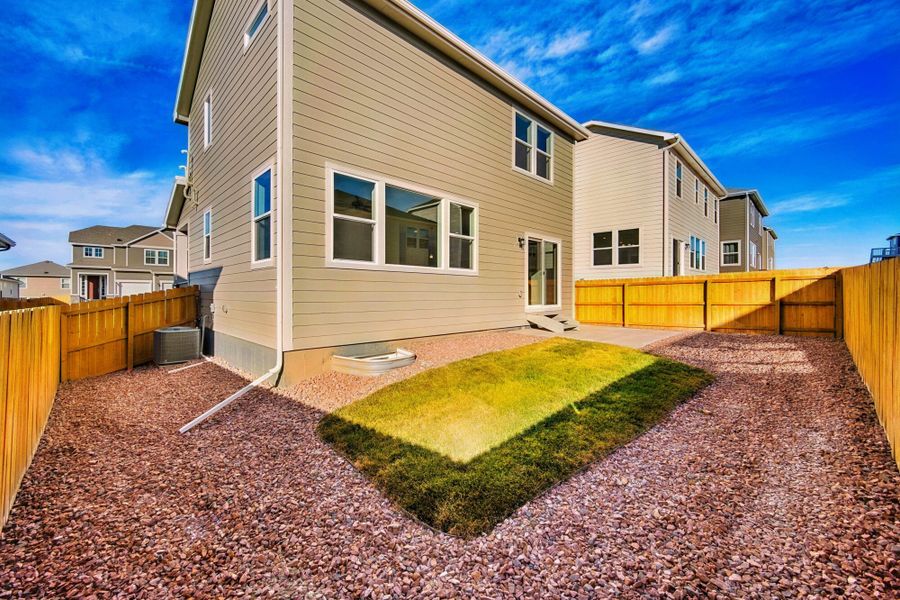 Exterior details and patio area of a home in Ridge at Lorson Ranch, Colorado Springs (Image 3).