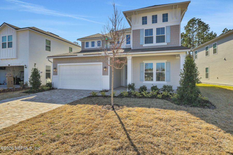 Front exterior of a new home in , Ponte Vedra, FL, highlighting curb appeal (Image 27). Front exterior of a new home in , Ponte Vedra, FL, highlighting curb appeal (Image 27).