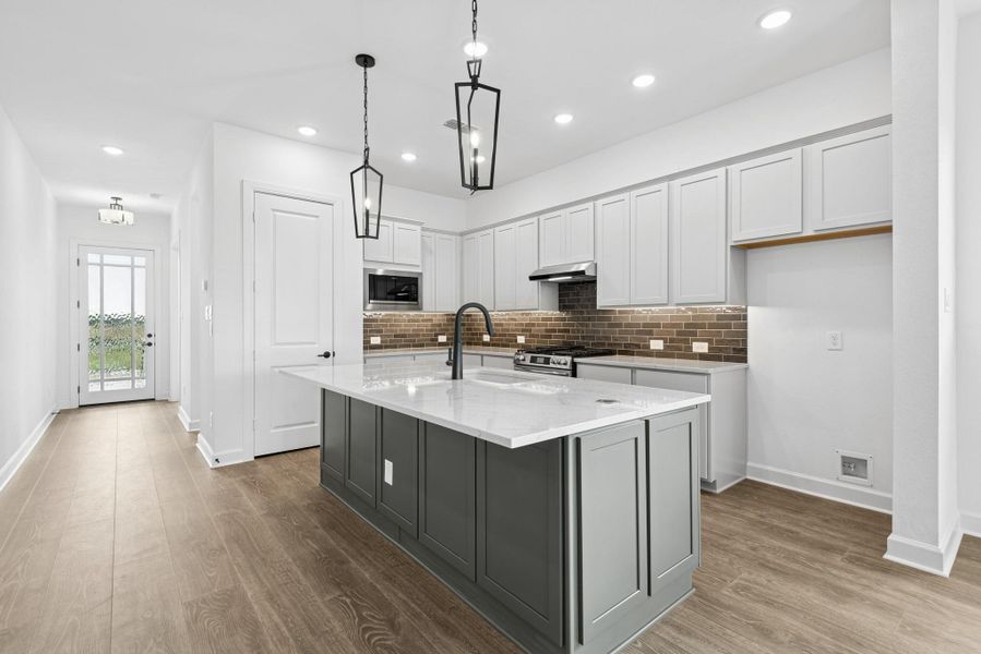 Furnished interior view inside a new home in Riceland - Enclave Row Collection, Mont Belvieu (Image 9).