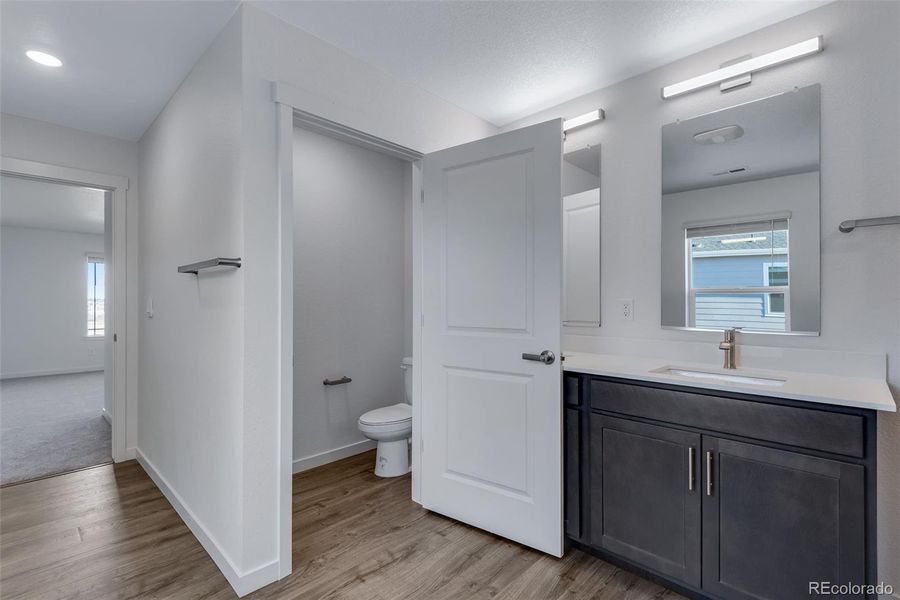 Furnished interior view inside a new home in Trails at Crowfoot, Parker (Image 15).