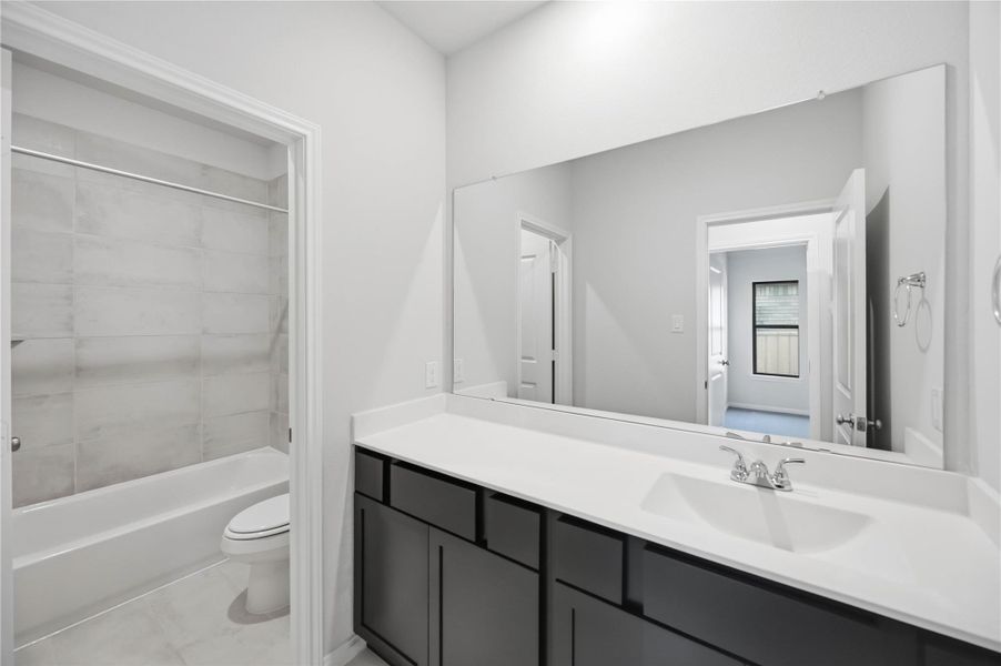 Furnished interior view inside a new home in Sundance Cove, Crosby (Image 8).