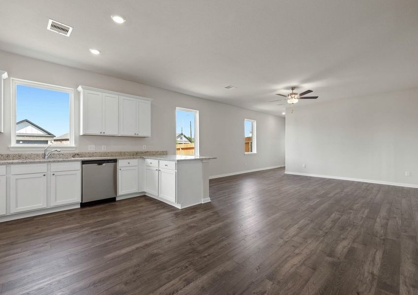 Spacious family room and chef-ready kitchen Spacious family room and chef-ready kitchen