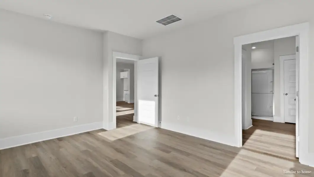 Spacious, unfurnished interior of a new home in The Highlands at Cedar Hill Landing, Navassa (Image 26).