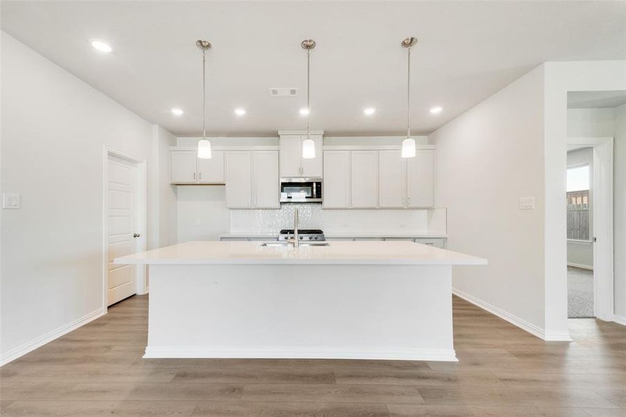 Furnished interior view inside a new home in Villages of Hurricane Creek, Anna (Image 8). Furnished interior view inside a new home in Villages of Hurricane Creek, Anna (Image 8).