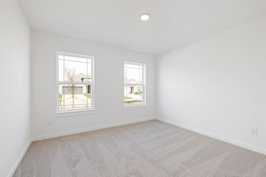 Spacious, unfurnished interior of a new home in Sunterra, Katy (Image 25).