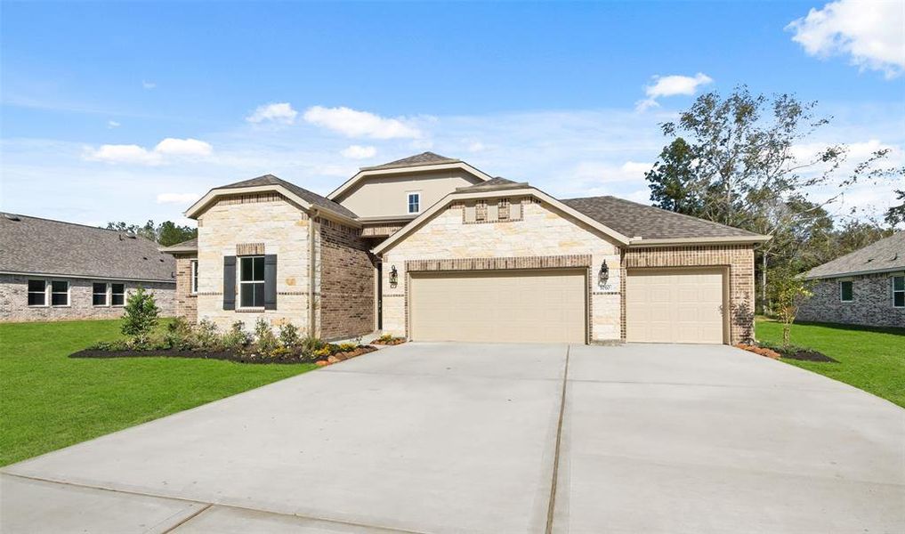 Stunning Boise design by K. Hovnanian Homes in elevation TA built in beautiful Tarkington Timbers.