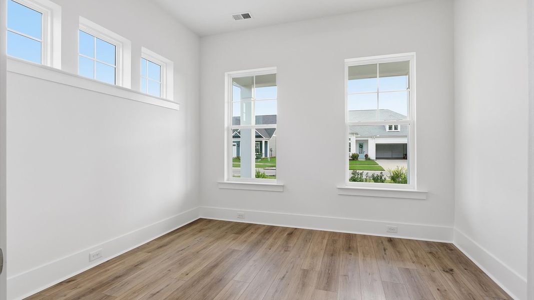 Representative furnished interior of a home built from the Eden by DRB Elevate. in Summerwind Crossing at Lakes of Cane Bay, Summerville (Image 18).