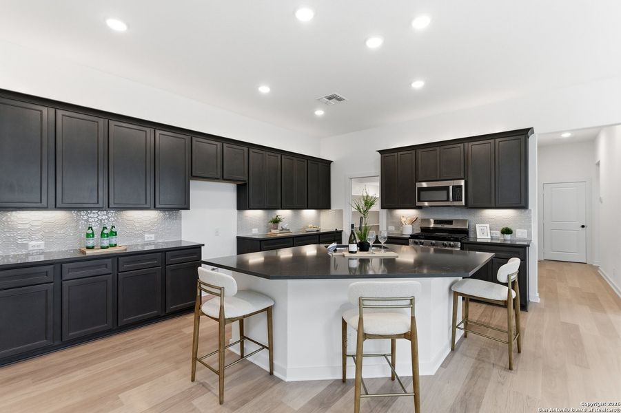 Furnished interior view inside a new home in The Crossvine, Schertz (Image 8).