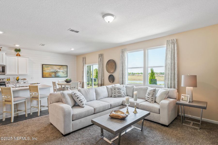 Furnished interior view inside a new home in Sawmill Branch, Palm Coast (Image 15).